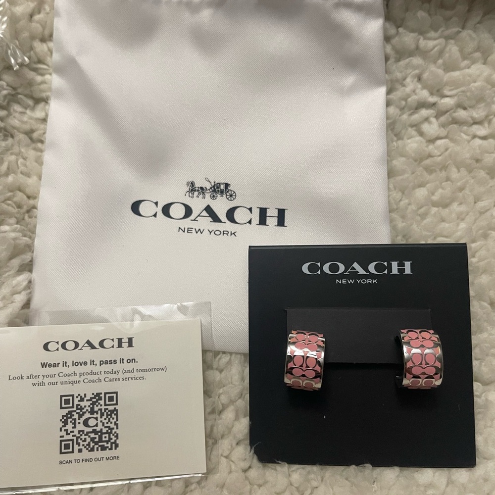 Coach Women's Earrings in Pink and silver small signature hoop.